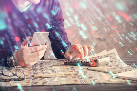 Multi exposure of man's hand holding and using a digital device and data theme drawing. Innovation...