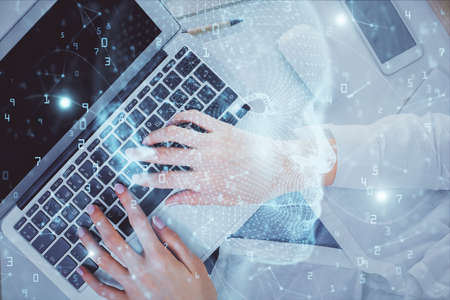 Double exposure of woman working on computer andhuman brain hologram drawing. Top View. Ai concept.