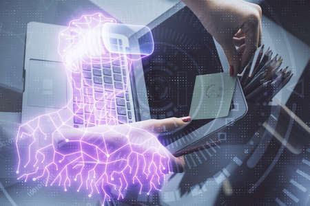 Double exposure of woman hands typing on computer and man in AR glasses drawing. Education concept.
