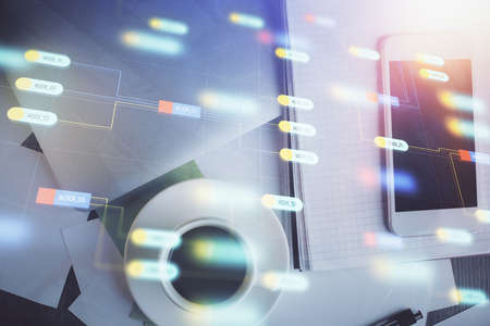 Double exposure of technology theme drawing over work table desktop. Top view. Global data analysis...