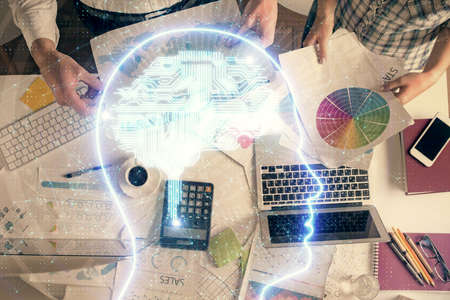 Double exposure of man and woman working together and human brain hologram drawing. Brainstorm...