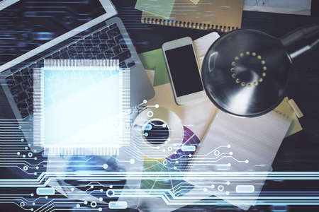 Multi exposure of data theme drawing hologram over topview work desk background with computer....