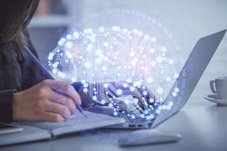 Multi exposure of woman hands working on computer and human brain hologram drawing. Ai tech concept.