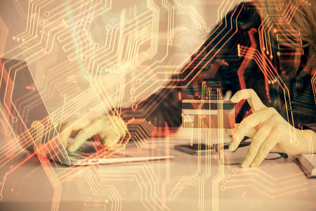 Multi exposure of woman on-line shopping holding a credit card and tech theme drawing. Technology...