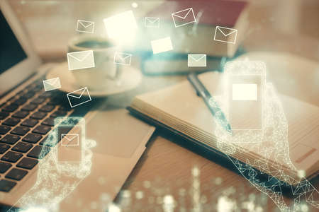 Double exposure of envelope drawing and desktop with coffee and items on table background. Concept of people connection.の写真素材