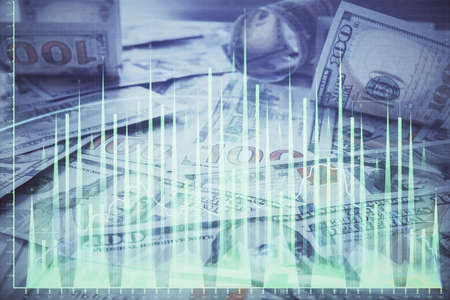 Multi exposure of forex chart drawing over us dollars bill background. Concept of financial success markets.の写真素材