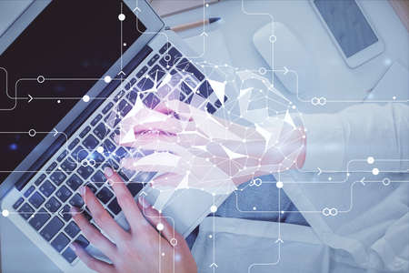 Double exposure of woman working on computer andhuman brain hologram drawing. Top View. Ai concept.