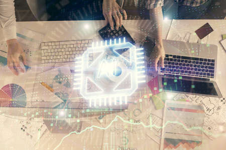 Double exposure of man and woman working together and technology theme drawing hologram. Big data...