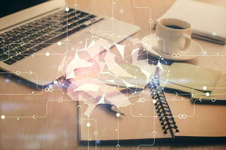 Double exposure of brain drawing and desktop with coffee and items on table background. Concept of...