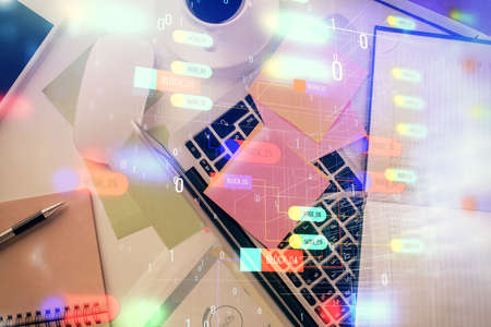Double exposure of data hologram sketch over study table background with computer. Concept of Ai. Top view.の写真素材