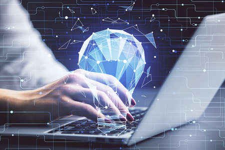 Double exposure of woman hands typing on computer and light bulb drawing. Idea concept.