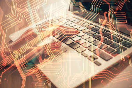 Double exposure of woman hands typing on computer and technology theme drawing. High Tech concept.