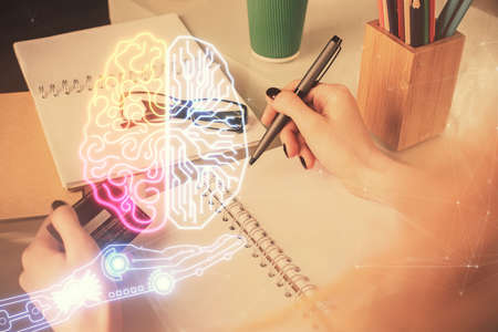 Double exposure of woman on-line shopping holding a credit card and brain hologram drawing. Data E-commerce concept.の写真素材