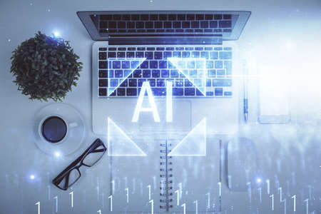 Double exposure of data drawing hologram over topview of study desk background with computer....