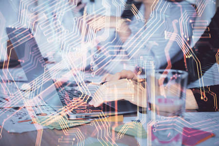 Double exposure of woman hands typing on computer and technology theme drawing. High Tech concept.の写真素材