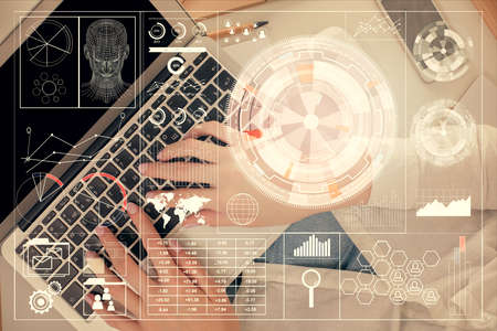 Double exposure of woman hands working on computer and data theme hologram drawing. Top View....