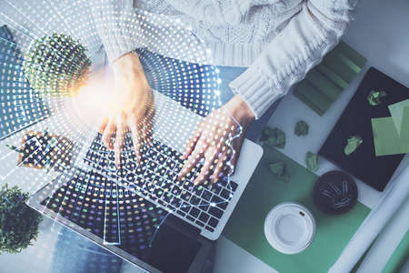 Double exposure of woman working on computer andhuman brain hologram drawing. Top View. Ai concept.の写真素材
