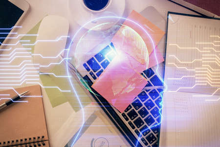 Multi exposure of brain sketch hologram over topview work table background with computer. Concept of...