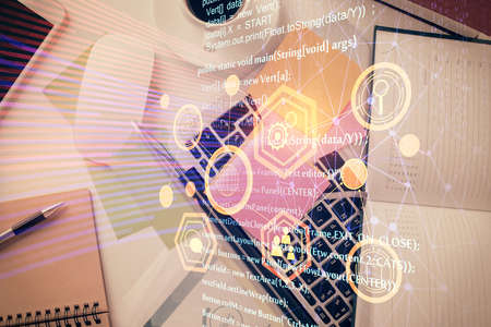Double exposure of data hologram sketch over study table background with computer. Concept of Ai....