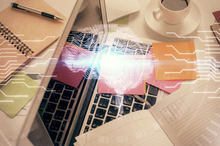 Multi exposure of brain sketch hologram over topview work table background with computer. Concept of...