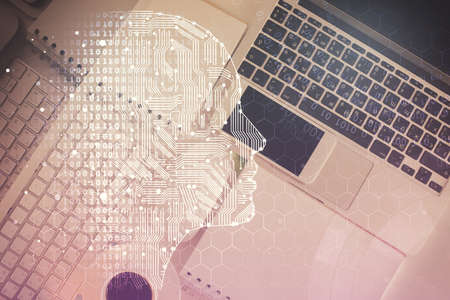 Double exposure of brain drawing hologram over topview work table background with computer. Concept of big data.の写真素材