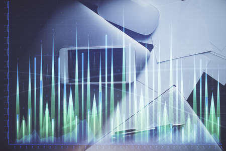 Multi exposure of forex graph hologram over desktop with phone. Top view. Mobile trade platform...