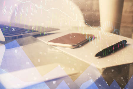 Double exposure of forex graph drawing and cell phone background. Concept of financial data analysis