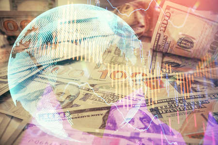 Multi exposure of forex chart drawing over us dollars bill background. Concept of financial success markets.の写真素材