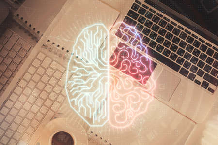 Double exposure of brain drawing hologram over topview work table background with computer. Concept of big data.の写真素材