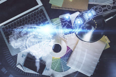 Double exposure of brain drawing hologram over topview work table background with computer. Concept...