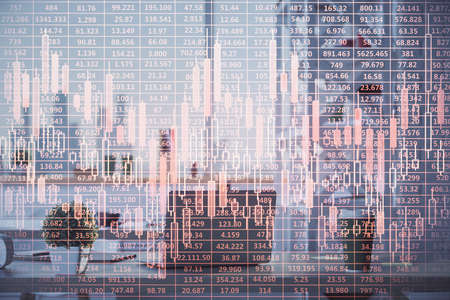 Double exposure of stock market graph drawing and office interior background. Concept of financial...