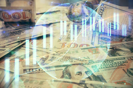 Multi exposure of forex chart drawing over us dollars bill background. Concept of financial success markets.の写真素材