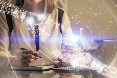 Multi exposure of woman hands working on computer and data theme hologram drawing. Tech concept.