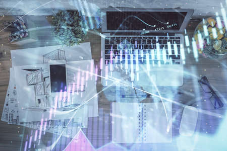 Multi exposure of financial chart drawing over table background with computer. Concept of research....