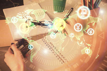 Multi exposure of woman on-line shopping holding a credit card and financial graph drawing. Stock...