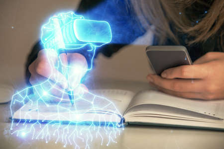 Double exposure of woman hands typing on computer and man in AR glasses drawing. Education concept.
