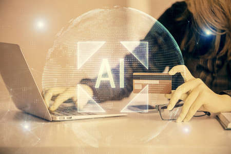Double exposure of woman on-line shopping holding a credit card and data theme hologram drawing. E-commerce concept.の写真素材