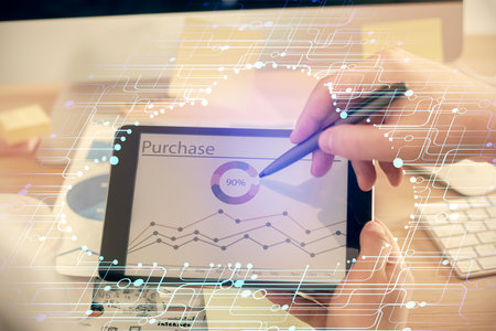 Multi exposure of man's hands holding and using a digital device and data theme drawing. Innovation concept.の写真素材