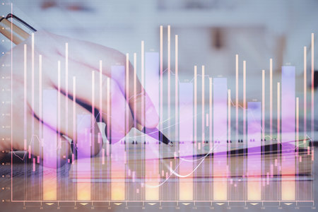 Double exposure of man doing notes of stock market with forex graph. Concept of research and trading.の写真素材