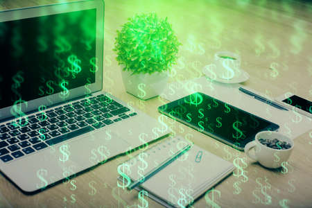 Forex market graph hologram and personal computer on background. Double exposure. Concept of investment.の写真素材