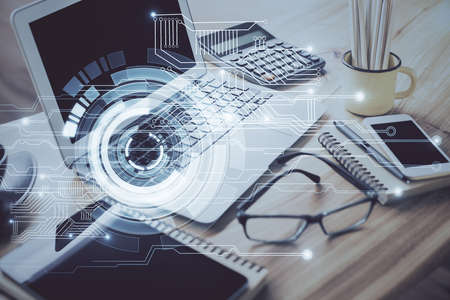 Double exposure of table with computer on background and data theme drawing. Concept of innovation.