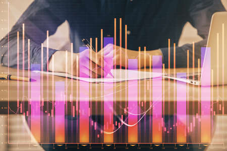 Double exposure hands with stock market chart. Concept of research and analysis.