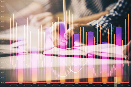 Multi exposure of two men planing investment with stock market forex chart background. Concept of...