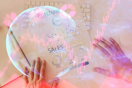 Double exposure of hands and notepad with business icons. Concept of international business.の写真素材