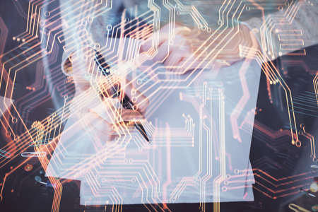 Technology theme hologram over woman's hands taking notes background. Concept of Tech. Double...
