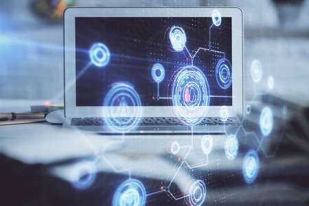 Multi exposure of desktop computer and technology theme hologram. Concept of software development.の写真素材