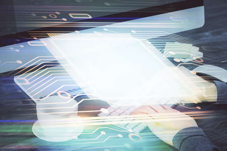 Double exposure of tech drawings with hands working on computer background. Concept of innovation.