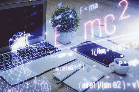 Desktop computer background and formula hologram writing. Double exposure. Education concept.