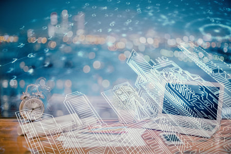 Desktop computer background in office and big town buildings hologram drawing. Double exposure....