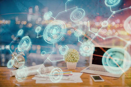Computer on desktop with social network hologram. Double exposure. Concept of international people...